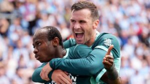 Brighton and Hove Albion's Malick Yalcouye celebrates with Pascal Gross during the English Premier League match between Coventry City and Brighton and Hove Albion in Coventry, England, Sunday Sept. 13, 2026. (Mike Egerton/PA via AP)