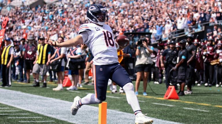 Chicago Bears quarterback Caleb Williams (18) runs to score a touchdown during the first half of an NFL football game, Sunday, Sept. 13, 2026, in Charlotte, N.C. (Scott Kinser/AP)