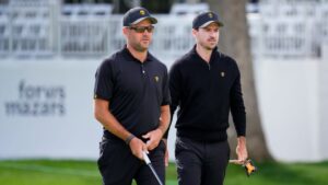 International teams' Corey Conners and Nick Taylor, of Canada, practice on the 14th hole prior to the start of the Presidents Cup golf tournament against the USA team at Medinah Country Club, Wednesday, Sept. 23, 2026, in Medinah, Ill. (Matt Slocum/AP)