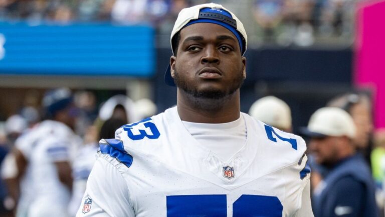 Dallas Cowboys offensive lineman Tyler Smith stands on the sideline during an NFL preseason football game against the Seattle Seahawks, Aug. 15, 2026, in Seattle. (Stephen Brashear/AP)