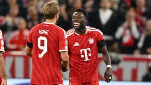 Bayern's Alphonso Davies, right, celebrates with Harry Kane after scoring his side's third goal during the Champions League opening phase soccer match between Bayern Munich and Bodo Glimt in Munich, Germany, Thursday, Sept. 10, 2026. (Lennart Preiss/AP Photo)