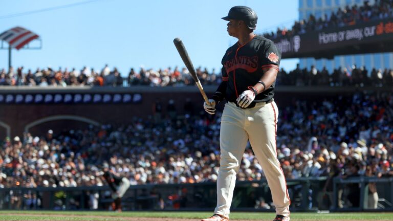 San Francisco Giants' Rafael Devers walks back to the dugout after striking out during the eighth inning of a baseball game against the San Diego Padres in San Francisco, Saturday, Sept. 12, 2026. (Jed Jacobsohn/AP)