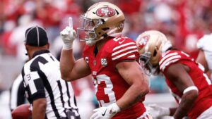San Francisco 49ers running back Christian McCaffrey celebrates after scoring against the Miami Dolphins during the first half of an NFL football game in Santa Clara, Calif., Sunday, Sept. 20, 2026. (Kelley L. Cox/AP)