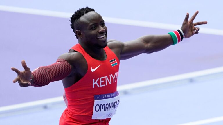 Ferdinand Omanyala, of Kenya, reacts after qualifying in a men's 100 meters round 1 heat at the 2024 Summer Olympics, Saturday, Aug. 3, 2024, in Saint-Denis, France. (Martin Meissner/AP)