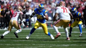 Los Angeles Rams defensive end Myles Garrett (95) tries to get past San Francisco 49ers offensive tackle Trent Williams (71) in the second half of an NFL football game in Melbourne, Australia, Friday, Sept. 11, 2026. (Doug Benc/AP Photo)