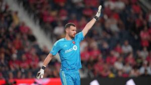 Toronto FC goalkeeper Luka Gavran pauses during the second half of an MLS soccer match. (Jeff Roberson/AP)
