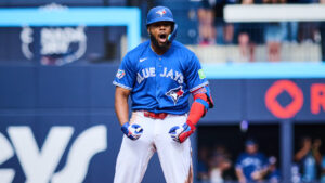 Toronto Blue Jays' Vladimir Guerrero Jr. (27) celebrates after hitting an RBI double against the Baltimore Orioles during first inning MLB baseball action in Toronto, on Saturday, Sept. 12, 2026. (Sammy Kogan/CP)