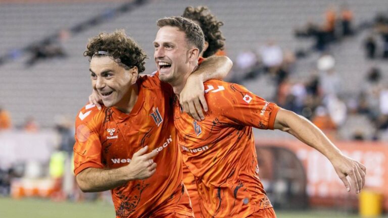 Forge FC teammates Maxime Bourgeois (87) and Ben Paton (6) celebrate a goal during the first half of a Canadian Championship semifinal soccer match against FC Supra, in Hamilton, Ont., on Tuesday, Sept. 15, 2026. (Nick Iwanyshyn/CP)