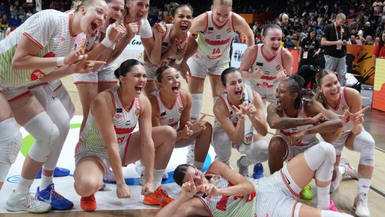 Hungary players celebrate defeating Japan after the Women's Basketball World Cup qualification playoff between Hungary and Japan in Berlin, Tuesday Sept. 8, 2026. (Ebrahim Noroozi/AP)