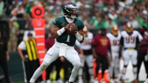 Philadelphia Eagles quarterback Jalen Hurts (1) looks to pass against the Washington Commanders during the first half of an NFL football game, Sunday, Sept. 13, 2026, in Philadelphia. (Matt Rourke/AP)