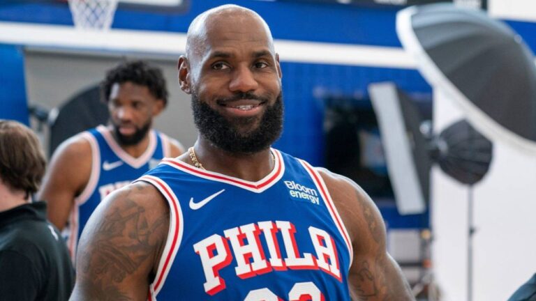 Philadelphia 76ers' LeBron James reacts as he goes between stations during the NBA basketball team's media day, Monday, Sept. 28, 2026, in Camden, N.J.. (Chris Szagola/AP)