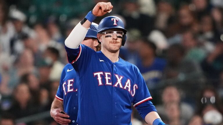 Texas Rangers' Danny Jansen celebrates an RBI single against the Seattle Mariners during the seventh inning of a baseball game, Tuesday, Sept. 8, 2026, in Seattle. (Lindsey Wasson/AP Photo)