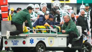 Green Bay Packers wide receiver Jayden Reed (11) is taken off the field following an injury during an NFL football game againt the New York Jets. (Yuki Iwamura/AP)