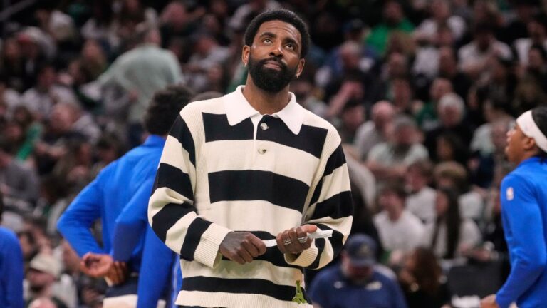Dallas Mavericks guard Kyrie Irving on the bench during an NBA basketball game, Friday, March 6, 2026, in Boston. (Charles Krupa/AP)