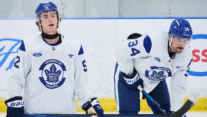 Toronto Maple Leafs' Gavin McKenna (92), left, practices alongside Auston Matthews (34) during the opening week of the team's NHL training camp in Toronto, on Thursday, Sept. 17, 2026. (Sammy Kogan/CP)