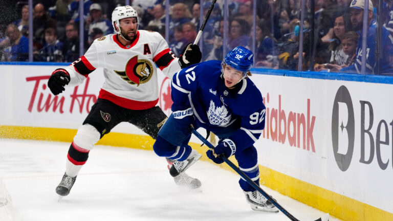 Toronto Maple Leafs' Gavin McKenna (92) is chased by Ottawa Senators Michael Amadio (22) during second period NHL hockey pre season action in Toronto on Wednesday, Sept. 23, 2026. (Frank Gunn/CP)