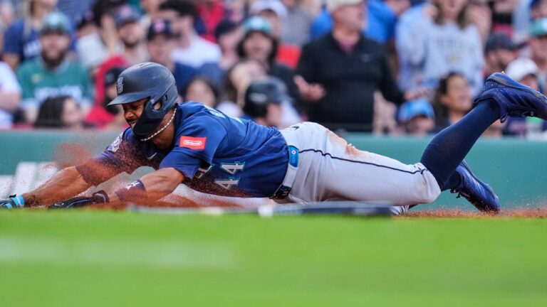 Seattle Mariners' Julio RodrÃguez scores on a single by Josh Naylor during the third inning of a baseball game against the Boston Red Sox, Wednesday, Sept. 2, 2026, in Boston. (Charles Krupa/AP Photo)