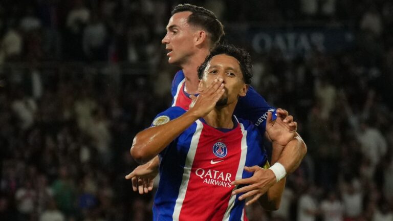 PSG's Marquinhos, front, celebrates with teammate Fabian Ruiz after scoring the opening goal during the French League One soccer match between Paris Saint-Germain and Monaco, in Paris, France, Friday, Sept. 4, 2026. (Aurelien Morissard/AP)