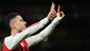 Arsenal's Gabriel Martinelli celebrates after scoring his side's second goal during the Champions League opening phase soccer match between Arsenal and Atletico Madrid in London, England, Tuesday, Oct. 21, 2025. (Alastair Grant/AP)