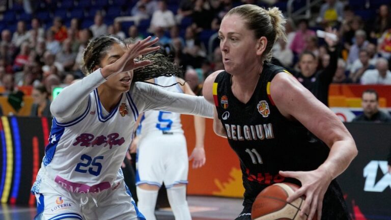 Puerto Rico's Denise Solís guards Belgium's Emma Meesseman during the Women's Basketball World Cup match between Puerto Rico and Belgium in Berlin, Sunday, Sept. 6, 2026. (Ebrahim Noroozi/AP)