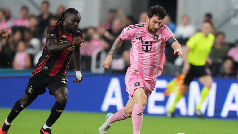 Inter Miami forward Leo Messi, right, runs with the ball as Atlanta United midfielder Tristan Muyumba defends during the first half of an MLS soccer match, Saturday, Sept. 5, 2026, in Miami. (Lynne Sladky/AP)