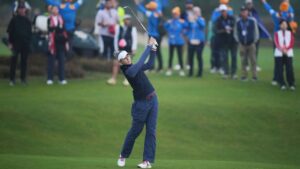 Nelly Korda of the United States plays a shot into the first green during the Solheim Cup at the Bernardus Golf course in Den Bosch. (Alastair Grant/AP)