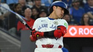 Toronto Blue Jays' Kazuma Okamoto (7) ducks away from an inside pitch during fourth inning MLB baseball action against the Detroit Tigers in Toronto on Tuesday, Sept. 15, 2026. (Jon Blacker/CP)