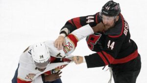 Carolina Hurricanes' Nicolas Deslauriers (44) exchanges blows with Florida Panthers' Bokondji Imama (14) during the first period of an NHL hockey game in Raleigh, N.C., Tuesday, Sept. 29, 2026. (Karl DeBlaker/AP Photo)