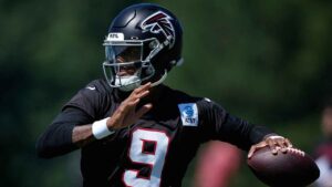 Atlanta Falcons quarterback Michael Penix Jr. (9) runs drills during an NFL football training camp practice. (Brynn Anderson/AP)