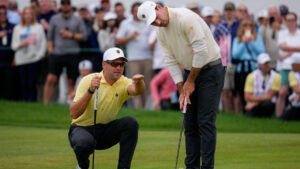 International teams' Corey Conners, of Canada, left, and Nick Taylor, of Canada, line up their shot on the seventh green against the USA team during the Presidents Cup golf tournament second round foursomes match at Medinah Country Club, Friday, Sept. 25, 2026, in Medinah, Ill. (Matt Slocum/AP)