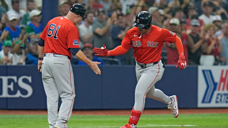 Boston Red Sox's Jahmai Jones celebrates his home run off Tampa Bay Rays pitcher Ian Seymour with third base coach Chad Epperson (81) during the third inning of a baseball game Friday, Sept. 18, 2026, in St. Petersburg, Fla. (Chris O'Meara/AP)