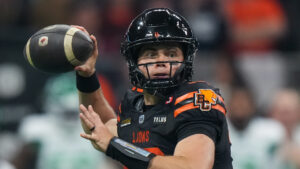 B.C. Lions quarterback Nathan Rourke passes during the first half of a CFL football game against the Saskatchewan Roughriders, in Vancouver, on Friday, Sept. 25, 2026. (Darryl Dyck/CP)
