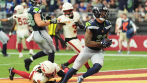 Seattle Seahawks wide receiver Jaxon Smith-Njigba (11) makes a touchdown catch against Arizona Cardinals cornerback Max Melton, left, during the second half of an NFL football game in Glendale, Ariz., Sunday, Sept. 20, 2026. (Ross D. Franklin/AP)