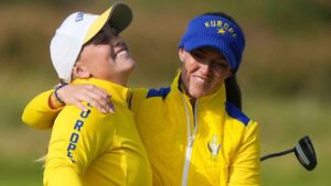 Maja Stark, left, of Europe celebrates with teammate Linn Grant on the 16th green during the Solheim Cup at the Bernardus Golf course in Den Bosch. (Alastair Grant/AP)