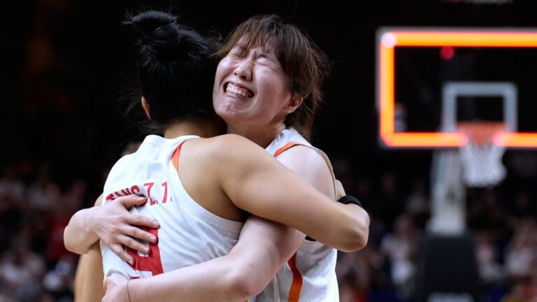 China's Tang Ziting, left, and Luo Xinyu celebrate after the Women's Basketball World Cup match between Czechia and China in Berlin, Sunday, Sept. 6, 2026. (Ebrahim Noroozi/AP)