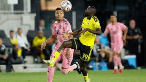 Columbus Crew's Jamal Thiare, right, controls the ball as Inter Miami's Carlos Casemiro,m left, defends during the second half of an MLS soccer match. (Jay LaPrete/AP)