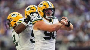 Green Bay Packers defensive end Lukas van Ness (90) celebrates a defensive stop against the Minnesota Vikings during the first half of an NFL football game. (Abbie Parr/AP)