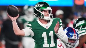 New York Jets quarterback Bailey Zappe (11) throws during the second half of a preseason NFL football game against the New York Giants, Friday, Aug. 28, 2026, in East Rutherford, N.J. (Frank Franklin II/AP Photo)