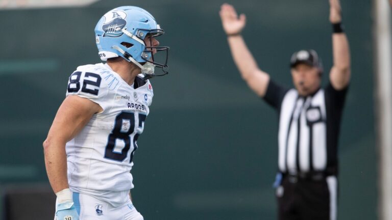 Toronto Argonauts' Tyler Kahmann (82) celebrates after scoring a touchdown against the Saskatchewan Roughriders during first half CFL football action in Regina on Saturday, Aug. 29, 2026. THE CANADIAN PRESS/Kayle Neis