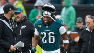 Philadelphia Eagles running back Saquon Barkley (26) reacts as he walks off the field after an injury during the first half of an NFL football game against the Los Angeles Rams in Philadelphia, Sunday, Oct. 4, 2026. (Chris Szagola/AP)
