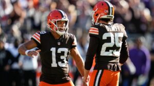Cleveland Browns punter Corey Bojorquez (13) celebrates place kicker Andre Szmyt's game-winning field goal during the second half of an NFL football game against the Baltimore Ravens in Cleveland, Sunday, Oct. 18, 2026. (AP Photo/Sue Ogrocki)