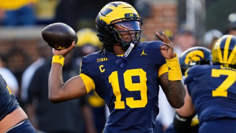 Michigan quarterback Bryce Underwood (19) plays against Iowa during the second half of an NCAA college football game in Ann Arbor, Mich., Saturday, Sept. 26, 2026. (AP Photo/Paul Sancya)