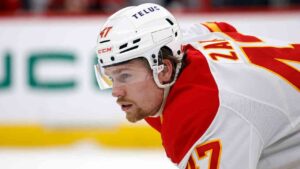 Calgary Flames' Connor Zary (47) watches the puck against the Carolina Hurricanes during the second period of an NHL hockey game in Raleigh, N.C., Sunday, Nov. 30, 2025. (Karl DeBlaker/AP)