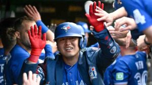 Toronto Blue Jays' Kazuma Okamoto, of Japan, celebrates with teammates after he hit a three-run home run during the eighth inning of a baseball game against the Chicago Cubs, Saturday, June 20, 2026, in Chicago. (Matt Marton/AP)