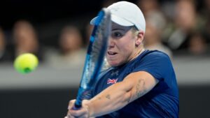 Sonay Kartal of Britain returns the ball to Marie Bouzkova of Czech Republic during a quarterfinal match for the Billie Jean King Cup held in Shenzhen in southern China's Guangdong province, Tuesday, Sept. 22, 206. (AP Photo/Andy Wong)