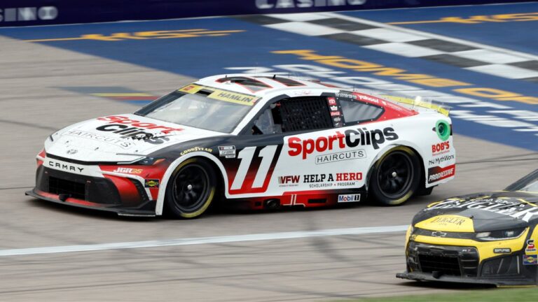 Joe Gibbs Racing driver Denny Hamlin (11) heads down the front straightaway during a NASCAR Cup Series auto race at Kansas Speedway in Kansas City, Kan., Sunday, Sept. 27, 2026. (AP Photo/Colin E. Braley)