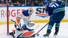 Canucks abandon winning details early as late rally falls short against Oilers