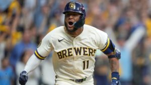 Milwaukee Brewers' Jackson Chourio celebrates after hitting a walkoff hit during the ninth inning of Game 2 of a National League Divisional baseball playoff series against the San Diego Padres Sunday, Oct. 4, 2026, in Milwaukee. (AP Photo/Kayla Wolf)