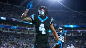 Carolina Panthers wide receiver Tetairoa McMillan (4) celebrates after scoring a touchdown against the Detroit Lions during an NFL football game in Charlotte, N.C., Sunday, Oct. 4, 2026. (Brian Westerholt/AP)