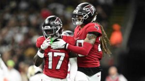 Atlanta Falcons' Zachariah Branch (17) celebrates with Mike Ford Sr. during the first half of an NFL football game against the New Orleans Saints in New Orleans, Monday, Oct. 5, 2026. (Ella Hall/AP)